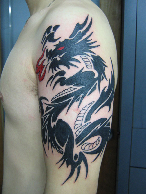 tatuaje de dragon en brazo